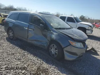 2013 Honda Odyssey EX-L with VIN 5FNRL5H6XDB015049, listed as a Copart auction lot 48691415 with 150,480 mi miles and Salvage Title. Bid and sale history available at DreamBid. Image 4.