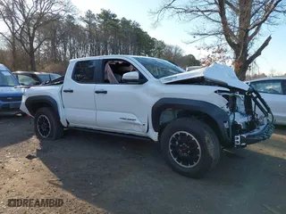2024 Toyota Tacoma 4WD TRD Sport Hybrid with VIN 3TYLC5LN2RT003005, listed as a IAAI auction lot 41742427 with 1 mi miles. Bid and sale history available at carsss.com. Image 13.