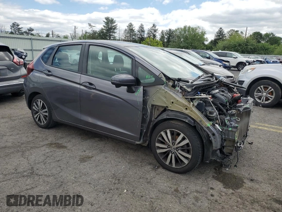 2015 Honda Fit EX-L z VIN 3HGGK5H8XFM776885, wystawiony jako Copart lot #57298225 z przebiegiem Nie podano mil oraz Szkoda całkowita • Salvage title. Historia ofert i sprzedaży dostępna na DreamBid. Obrazek 4.