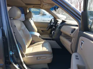 2009 Honda Pilot EX-L with VIN 5FNYF485X9B006704, listed as a IAAI auction lot 41749272 with 34,480 mi miles. Bid and sale history available at carsss.com. Image 5.
