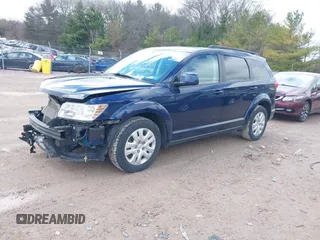 2019 Dodge Journey SE with VIN 3C4PDCBBXKT707700, listed as a IAAI auction lot 42038474 with 57,903 mi miles and . Bid and sale history available at DreamBid. Image 2.