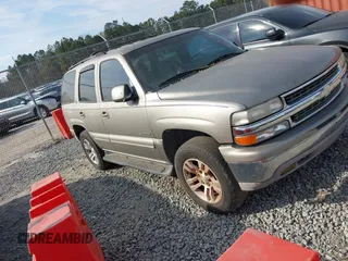2001 Chevrolet Tahoe LS z VIN 1GNEC13T51R154488, wystawiony jako IAAI lot #41519004 z przebiegiem 400 208 mil mil oraz . Historia ofert i sprzedaży dostępna na DreamBid. Obrazek 1.