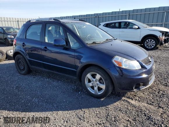 2010 Suzuki SX4 Touring with VIN JS2YB5A71A6310393, listed as a Copart auction lot 77673534 with 65,987 mi miles and Clean Title. Bid and sale history available at carsss.com. Image 4.