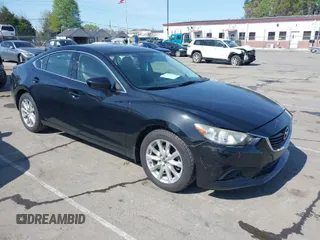 2016 Mazda Mazda6 i Sport with VIN JM1GJ1U54G1422560, listed as a IAAI auction lot 41935881 with 87,030 mi miles. Bid and sale history available at carsss.com. Image 1.