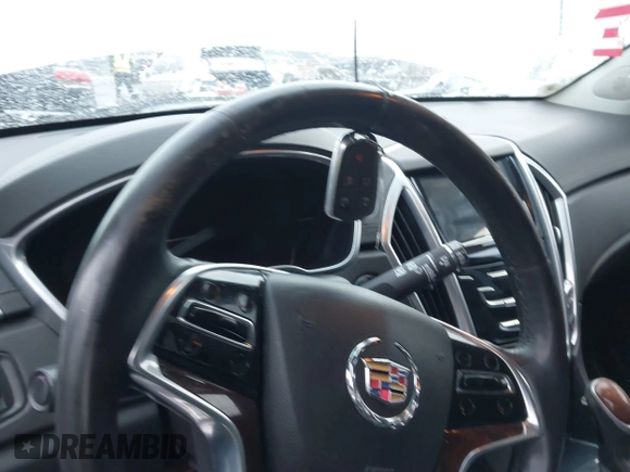 2016 Cadillac SRX Luxury Collection with VIN 3GYFNBE38GS532443, listed as a IAAI auction lot 41151179 with 74,499 mi miles. Bid and sale history available at carsss.com. Image 11.