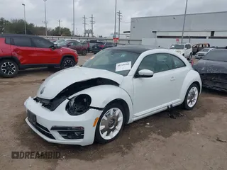 2019 Volkswagen Beetle S with VIN 3VWFD7AT2KM701622, listed as a IAAI auction lot 41520300 with Not provided miles and . Bid and sale history available at DreamBid. Image 18.