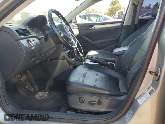 2013 Volkswagen Passat SE with VIN 1VWBP7A34DC042341, listed as a Copart auction lot 66894324 with 200,944 mi miles and Salvage title. Bid and sale history available at DreamBid. Image 7.