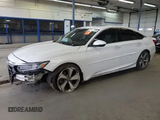 2018 Honda Accord Touring z VIN 1HGCV1F93JA218909, wystawiony jako Copart lot #57887175 z przebiegiem 76 398 mil mil oraz Szkoda całkowita • Salvage title. Historia ofert i sprzedaży dostępna na DreamBid. Obrazek 1.