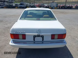 1991 Mercedes-Benz 560 with VIN WDBCA45E7MA610580, listed as a IAAI auction lot 42099161 with 83,344 mi miles and . Bid and sale history available at DreamBid. Image 16.