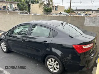 2013 Kia Rio EX with VIN KNADN4A3XD6150037, listed as a IAAI auction lot 42487891 with 150,999 mi miles and . Bid and sale history available at DreamBid. Image 3.
