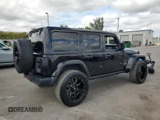 2019 Jeep Wrangler Unlimited Sahara with VIN 1C4HJXEN6KW595840, listed as a Copart auction lot 54382265 with 145,986 mi miles and Salvage Title. Bid and sale history available at carsss.com. Image 3.