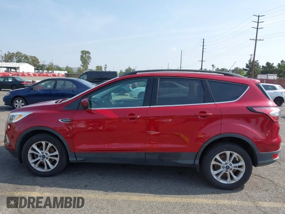 2017 Ford Escape SE with VIN 1FMCU0GD4HUC27041, listed as a IAAI auction lot 42127328 with 107,860 mi miles. Bid and sale history available at carsss.com. Image 14.
