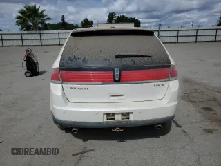2009 Lincoln MKX z VIN 2LMDU68C79BJ10255, wystawiony jako Copart lot #56764975 z przebiegiem 203 418 mil mil oraz Czysty tytuł • Clean title. Historia ofert i sprzedaży dostępna na DreamBid. Obrazek 6.