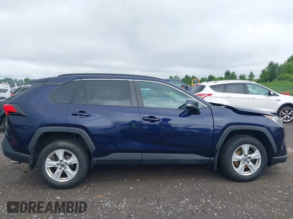2019 Toyota RAV4 XLE with VIN 2T3P1RFVXKC057616, listed as a IAAI auction lot 42685158 with 148,661 mi miles and . Bid and sale history available at DreamBid. Image 14.