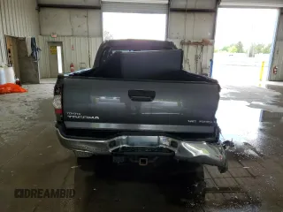 2013 Toyota Tacoma z VIN 3TMMU4FN7DM052275, wystawiony jako Copart lot #58338615 z przebiegiem 221 142 mil mil oraz Szkoda całkowita • Salvage title. Historia ofert i sprzedaży dostępna na DreamBid. Obrazek 6.