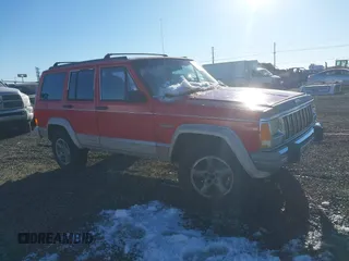 1996 Jeep Cherokee Country with VIN 1J4FJ78S1TL245327, listed as a IAAI auction lot 41443781 with 245,889 mi miles. Bid and sale history available at carsss.com. Image 1.