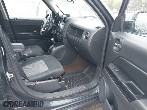 2014 Jeep Patriot Latitude with VIN 1C4NJRFB6ED689459, listed as a IAAI auction lot 42197469 with 202,899 mi miles. Bid and sale history available at carsss.com. Image 5.