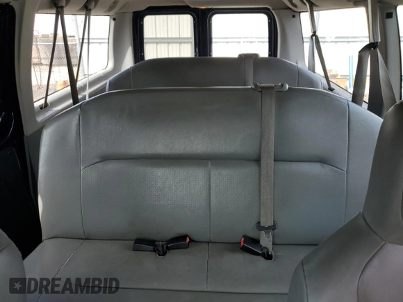 2011 Ford Econoline Passenger XL with VIN 1FMNE1BW2BDA00300, listed as a Copart auction lot 74028854 with 179,955 mi miles and Salvage Title. Bid and sale history available at DreamBid. Image 10.