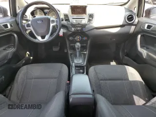 2014 Ford Fiesta SE z VIN 3FADP4BJ4EM110277, wystawiony jako Copart lot #56921115 z przebiegiem 126 536 mil mil oraz Szkoda całkowita • Salvage title. Historia ofert i sprzedaży dostępna na DreamBid. Obrazek 8.