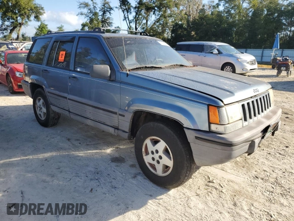 1995 Jeep Grand Cherokee Laredo with VIN 1J4FX58S4SC742471, listed as a Copart auction lot 76203034 with 206,717 mi miles and Non Repairable. Bid and sale history available at carsss.com. Image 4.