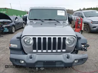 2018 Jeep Wrangler Unlimited Sport z VIN 1C4HJXDG1JW133543, wystawiony jako IAAI lot #41730522 z przebiegiem 81 667 mil mil oraz . Historia ofert i sprzedaży dostępna na DreamBid. Obrazek 12.