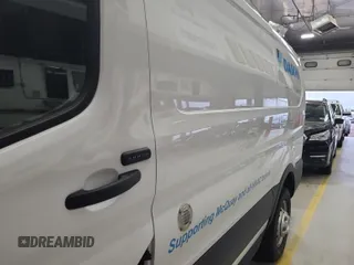 2020 Ford Transit Cargo with VIN 1FTBR2YG6LKA84460, listed as a IAAI auction lot 42839917 with 129,041 mi miles and . Bid and sale history available at DreamBid. Image 32.