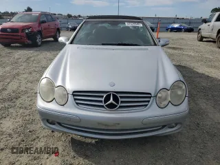 2005 Mercedes-Benz CLK 320 with VIN WDBTK65G65T052026, listed as a Copart auction lot 52526945 with 188,859 mi miles and Salvage Title. Bid and sale history available at DreamBid. Image 5.