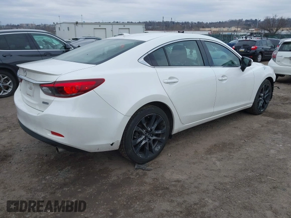 2016 Mazda 6 i Grand Touring with VIN JM1GJ1W54G1485851, listed as a IAAI auction lot 41629410 with 91,327 mi miles. Bid and sale history available at carsss.com. Image 4.