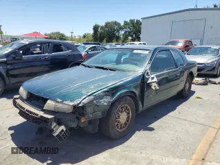 1995 Mercury Cougar z VIN 1MELM62W5SH627799, wystawiony jako Copart lot #61115064 z przebiegiem 31 957 mil mil oraz Szkody całkowita. Historia ofert i sprzedaży dostępna na DreamBid. Obrazek 1.