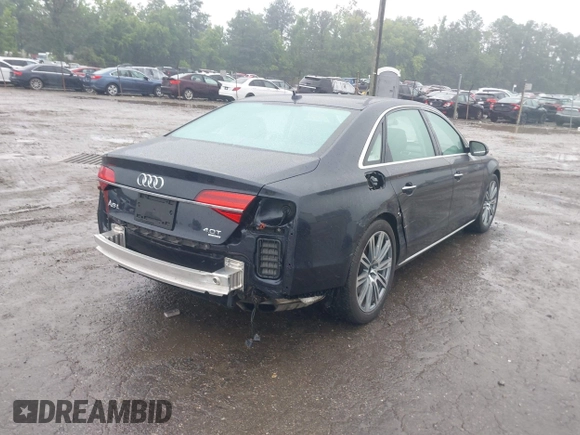 2015 Audi A8 4.0T with VIN WAU32AFD2FN026356, listed as a IAAI auction lot 42330082 with 44,857 mi miles and . Bid and sale history available at DreamBid. Image 4.