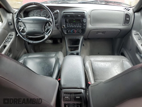 2000 Ford Explorer XLT z VIN 1FMZU63E3YZB39063, wystawiony jako Copart lot #74105104 z przebiegiem 231 003 mil mil oraz Szkoda całkowita • Salvage title. Historia ofert i sprzedaży dostępna na DreamBid. Obrazek 8.