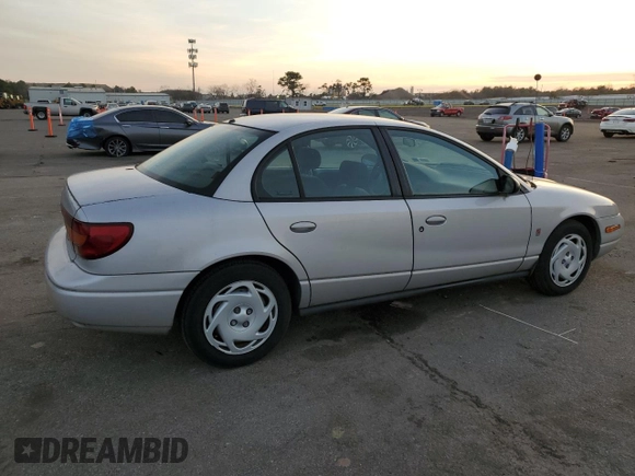 2001 Saturn SL z VIN 1G8ZK52761Z204012, wystawiony jako Copart lot #86618384 z przebiegiem 99 674 mil mil oraz Szkoda całkowita • Salvage title. Historia ofert i sprzedaży dostępna na DreamBid. Obrazek 3.