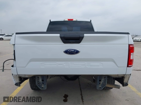 2018 Ford F-150 XL with VIN 1FTMF1CB4JKF54148, listed as a IAAI auction lot 42275439 with 157,811 mi miles and . Bid and sale history available at DreamBid. Image 17.