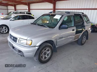 2001 Honda Passport LX z VIN 4S6CK58WX14402974, wystawiony jako IAAI lot #42374779 z przebiegiem 214 931 mil mil oraz . Historia ofert i sprzedaży dostępna na DreamBid. Obrazek 2.