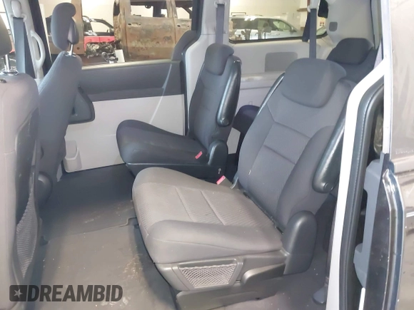 2010 Dodge Grand Caravan SXT with VIN 2D4RN5D19AR433481, listed as a IAAI auction lot 42123049 with 134,882 mi miles and . Bid and sale history available at DreamBid. Image 8.