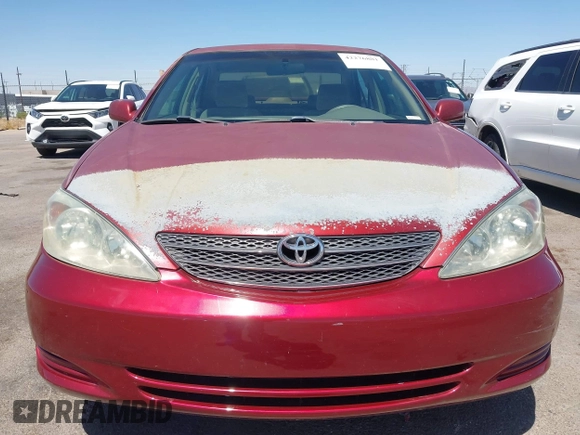 2002 Toyota Camry LE z VIN 4T1BE32K52U082454, wystawiony jako IAAI lot #42276881 z przebiegiem 225 814 mil mil oraz . Historia ofert i sprzedaży dostępna na DreamBid. Obrazek 12.
