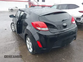 2012 Hyundai Veloster w/Black Int with VIN KMHTC6ADXCU024923, listed as a IAAI auction lot 41556793 with 101,923 mi miles and . Bid and sale history available at DreamBid. Image 3.