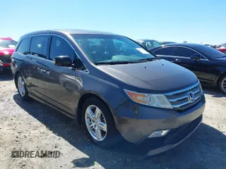 2012 Honda Odyssey Touring with VIN 5FNRL5H91CB057344, listed as a IAAI auction lot 41835272 with 158,854 mi miles. Bid and sale history available at carsss.com. Image 1.