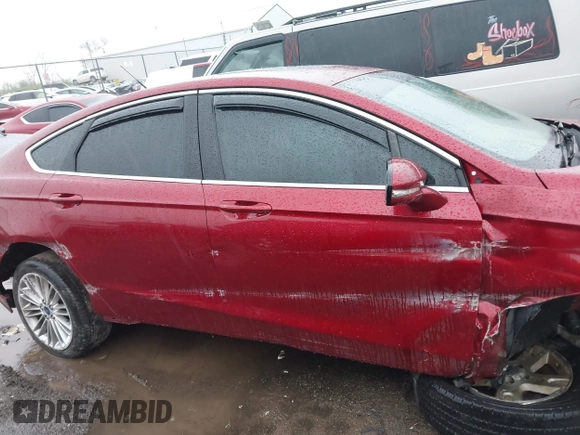 2016 Ford Fusion SE with VIN 3FA6P0H97GR171272, listed as a IAAI auction lot 41962976 with 130,904 mi miles and . Bid and sale history available at DreamBid. Image 13.