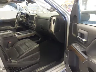 2017 GMC Sierra 2500HD Denali with VIN 1GT12UEY5HF249200, listed as a IAAI auction lot 41345624 with 243,166 mi miles. Bid and sale history available at carsss.com. Image 5.