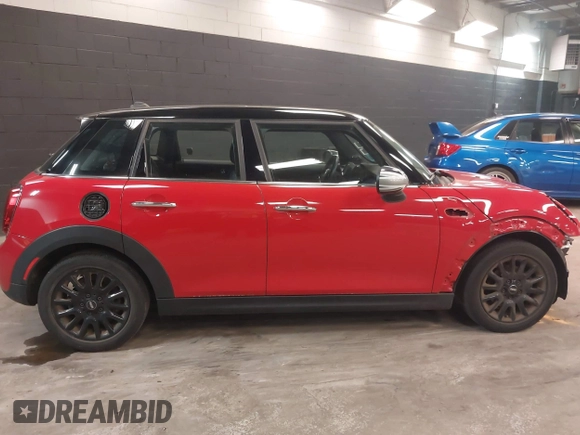 2019 MINI Hardtop 4 Door Cooper with VIN WMWXU1C57K2J02108, listed as a IAAI auction lot 42285864 with 19,383 mi miles and . Bid and sale history available at DreamBid. Image 14.