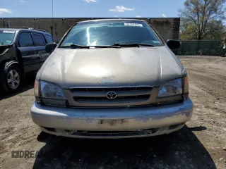 1999 Toyota Sienna LE with VIN 4T3ZF13C2XU112113, listed as a Copart auction lot 52162655 with 248,091 mi miles and Salvage Title. Bid and sale history available at carsss.com. Image 5.