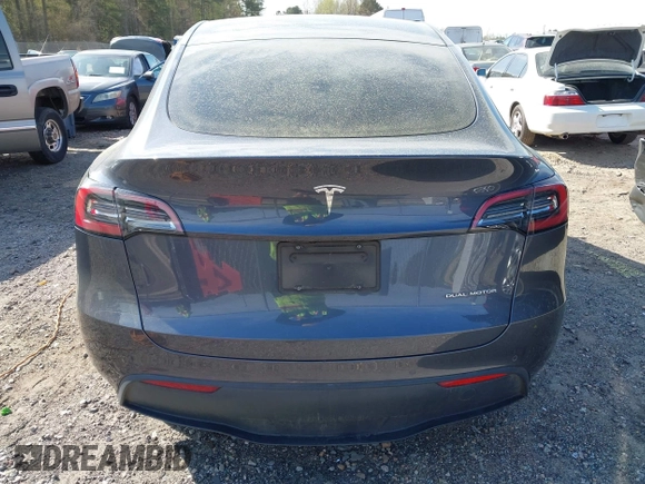 2022 Tesla Model Y Long Range z VIN 7SAYGDEE7NA006476, wystawiony jako IAAI lot #41894606 z przebiegiem 63 380 mil mil oraz . Historia ofert i sprzedaży dostępna na DreamBid. Obrazek 16.