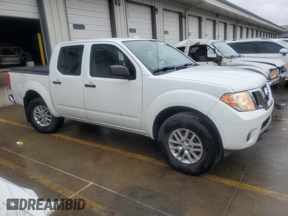 2015 Nissan Frontier S with VIN 1N6AD0EV9FN737834, listed as a Copart auction lot 85096904 with 101,683 mi miles and Salvage title. Bid and sale history available at DreamBid. Image 4.