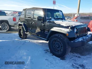 2016 Jeep Wrangler Unlimited Sport with VIN 1C4BJWDG7GL309344, listed as a IAAI auction lot 41107724 with 98,479 mi miles and . Bid and sale history available at DreamBid. Image 1.