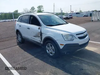 2014 Chevrolet Captiva Sport LS z VIN 3GNAL2EK0ES603331, wystawiony jako IAAI lot #42061441 z przebiegiem 128 041 mil mil oraz . Historia ofert i sprzedaży dostępna na DreamBid. Obrazek 1.