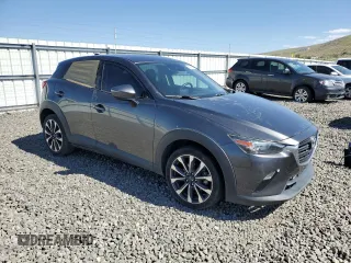2019 Mazda CX-3 Touring z VIN JM1DKFC72K0430266, wystawiony jako Copart lot #59765545 z przebiegiem 77 534 mil mil oraz Szkoda całkowita • Salvage title. Historia ofert i sprzedaży dostępna na DreamBid. Obrazek 4.