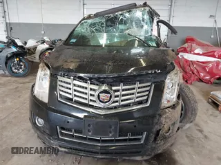 2014 Cadillac SRX Premium Collection with VIN 3GYFNGE35ES636852, listed as a IAAI auction lot 42283604 with 167,983 mi miles and . Bid and sale history available at DreamBid. Image 13.