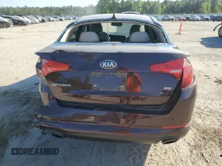 2013 Kia Optima LX z VIN 5XXGM4A72DG257851, wystawiony jako Copart lot #52409785 z przebiegiem 43 699 mil mil oraz Szkody całkowita. Historia ofert i sprzedaży dostępna na DreamBid. Obrazek 6.