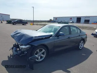 2014 BMW 3 Series 328i xDrive with VIN WBA3B5C50EP540357, listed as a IAAI auction lot 42052651 with 139,971 mi miles and . Bid and sale history available at DreamBid. Image 2.